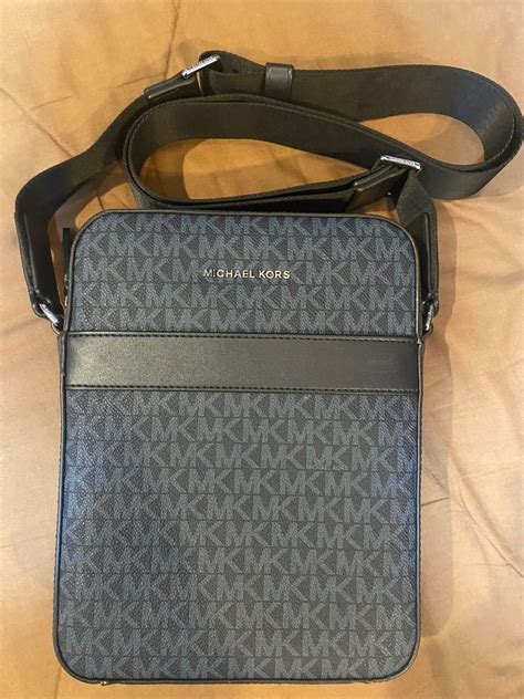 michael kors black and white sling bag|Michael Kors sling bag men.